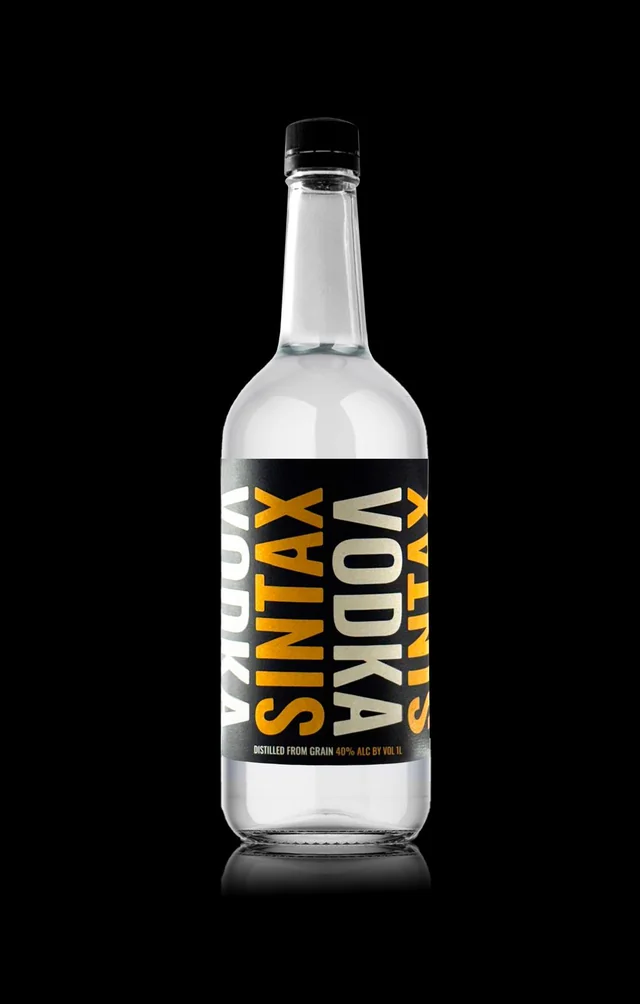 A 1 liter bottle of SINTAX Vodka with a black and amber label